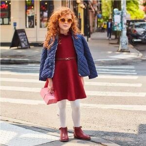 Janie and Jack girl's navy blue quilted peplum barn coat.